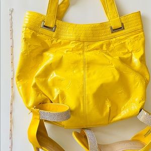 Big color pop of color - yellow bag!